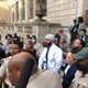 Adnan Syed, center, leaves the Elijah E. Cummings Courthouse, Monday, Sept. 19, 2022, in Baltimore. A judge has ordered the release of Syed after overturning his conviction for a 1999 murder that was chronicled in the hit podcast “Serial.”